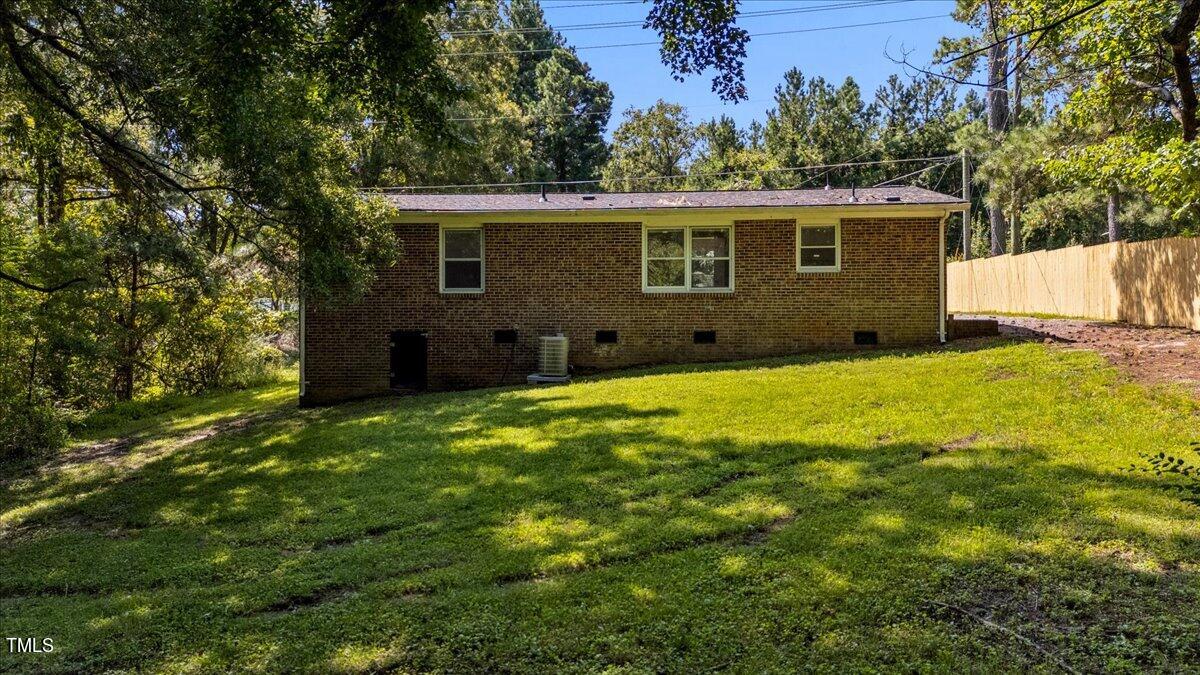 2530 Spring Valley Road Henderson, NC 27537 - Photo 43 of 45 a view of a house with a yard