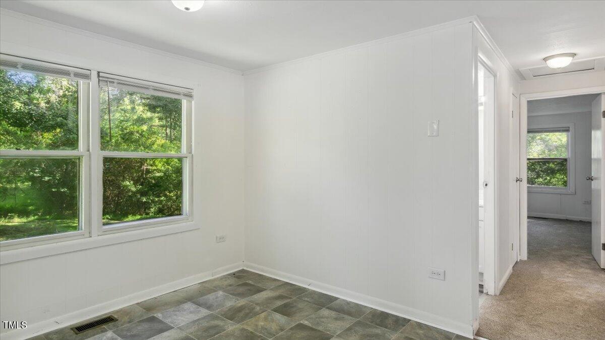 2530 Spring Valley Road Henderson, NC 27537 - Photo 10 of 45 an empty room with windows