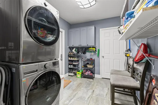 a view of a storage & utility room with washer and dryer