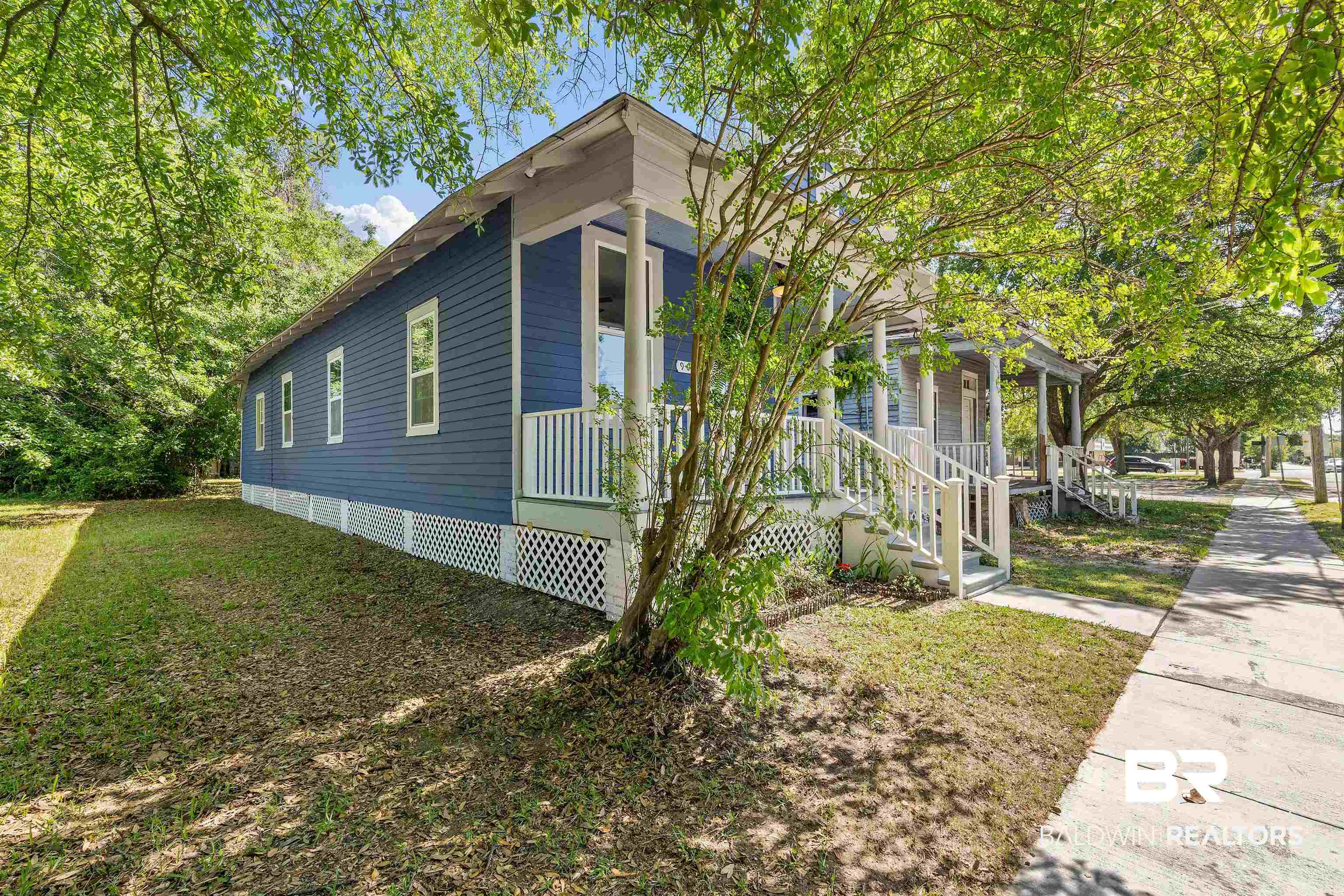 906 Texas Street Mobile, AL 36604 - Photo 3 of 25 View of side of home with covered porch