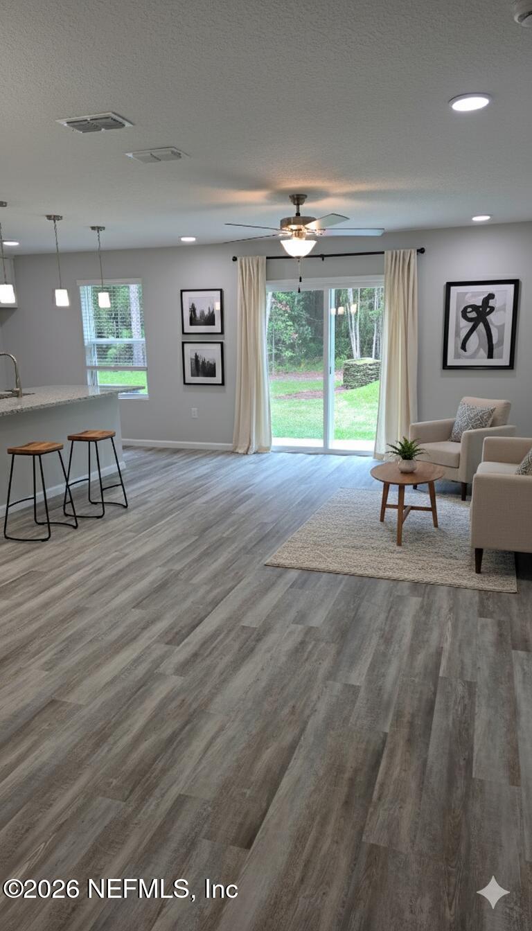 1082 Cahoon Road South Jacksonville, FL 32221 - Photo 4 of 9 a living room with furniture and a window