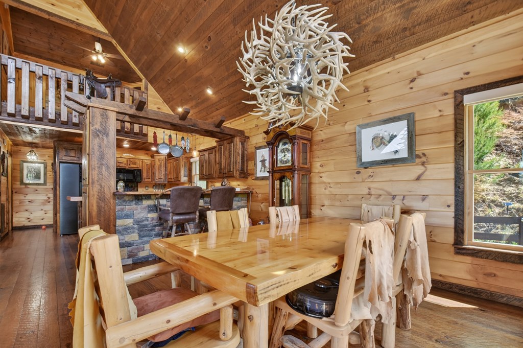 459 Quail Ridge Road Epworth, GA 30541 - Photo 43 of 73 a view of a dining room with furniture window and wooden floor