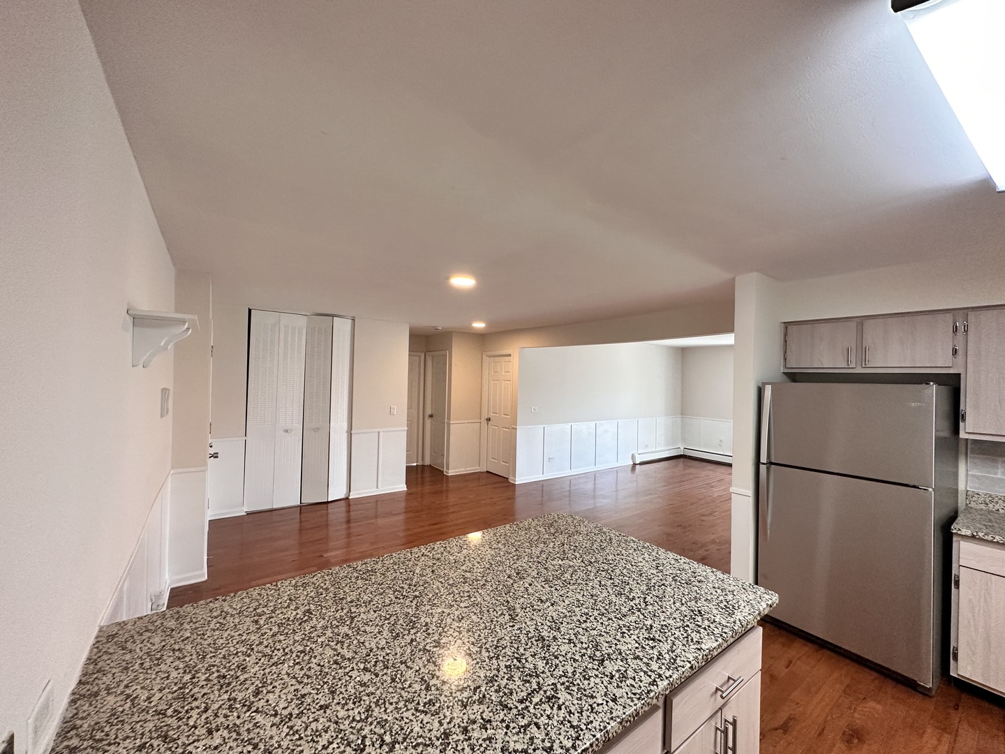 10357 Dearlove Road, Unit 1K Glenview, IL 60025 - Photo 11 of 24 a kitchen with a refrigerator and a sink