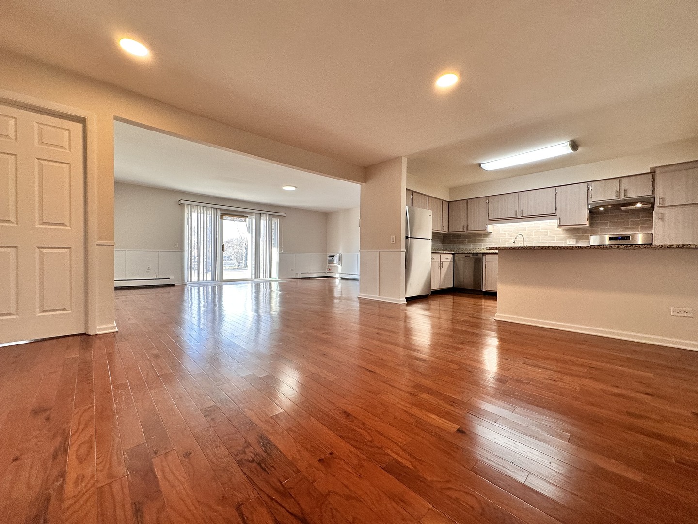 10357 Dearlove Road, Unit 1K Glenview, IL 60025 - Photo 12 of 24 a view of empty room with wooden floor