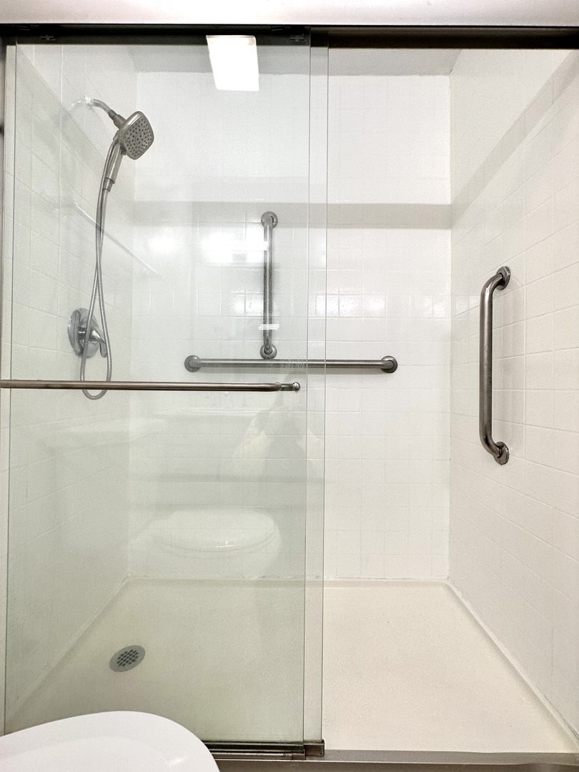 10357 Dearlove Road, Unit 1K Glenview, IL 60025 - Photo 17 of 24 a bathroom with a shower