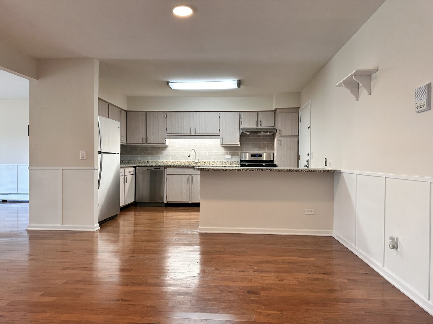 10357 Dearlove Road, Unit 1K Glenview, IL 60025 - Photo 6 of 24 a view of kitchen with wooden floor