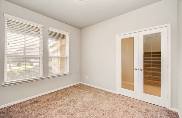 an empty room with windows