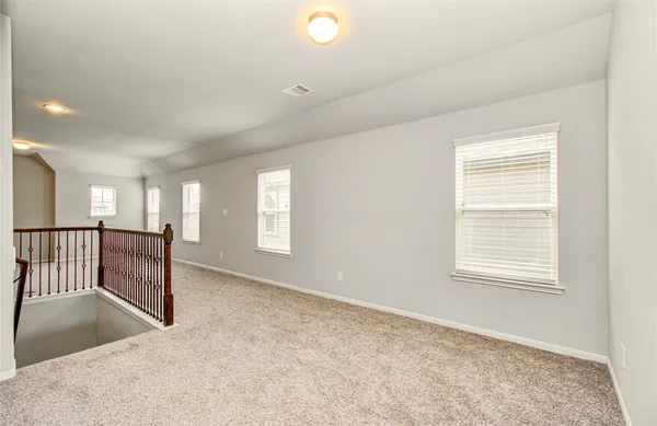 a view of a livingroom with a staircase