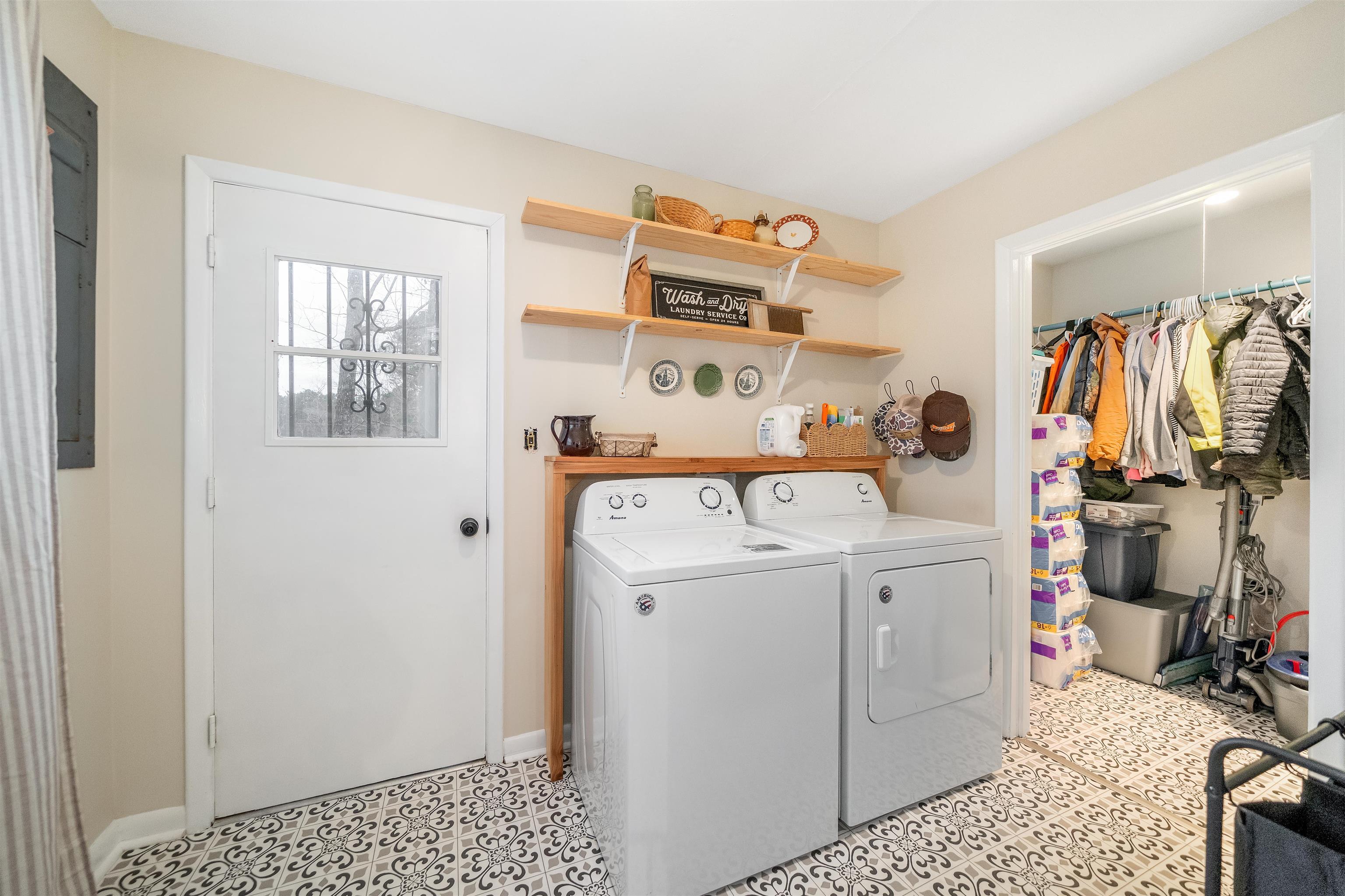 715 Burns Road Ramer, TN 38367 - Photo 17 of 20 Laundry area featuring independent washer and dryer and electric panel