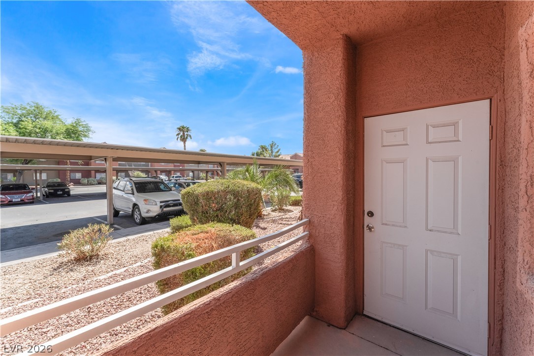 4730 East Craig Road, Unit 1058 Las Vegas, NV 89115 - Photo 29 of 30 Secure covered parking, with direct access to the entrance, creates a seamless daily routine.