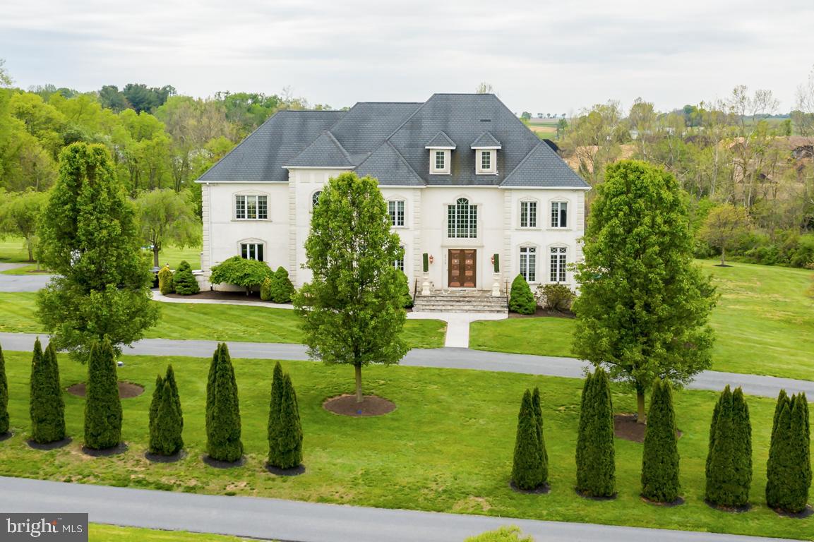 6779 Keller Lime Plant Road Frederick, MD 21703 - Photo 2 of 74 a front view of a house with garden