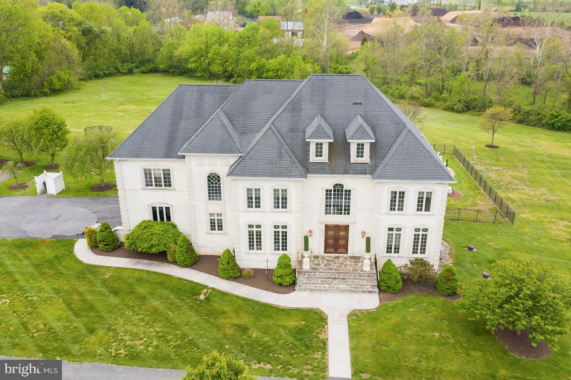 6779 Keller Lime Plant Road Frederick, MD 21703 - Photo 3 of 74 a aerial view of a house with yard and green space