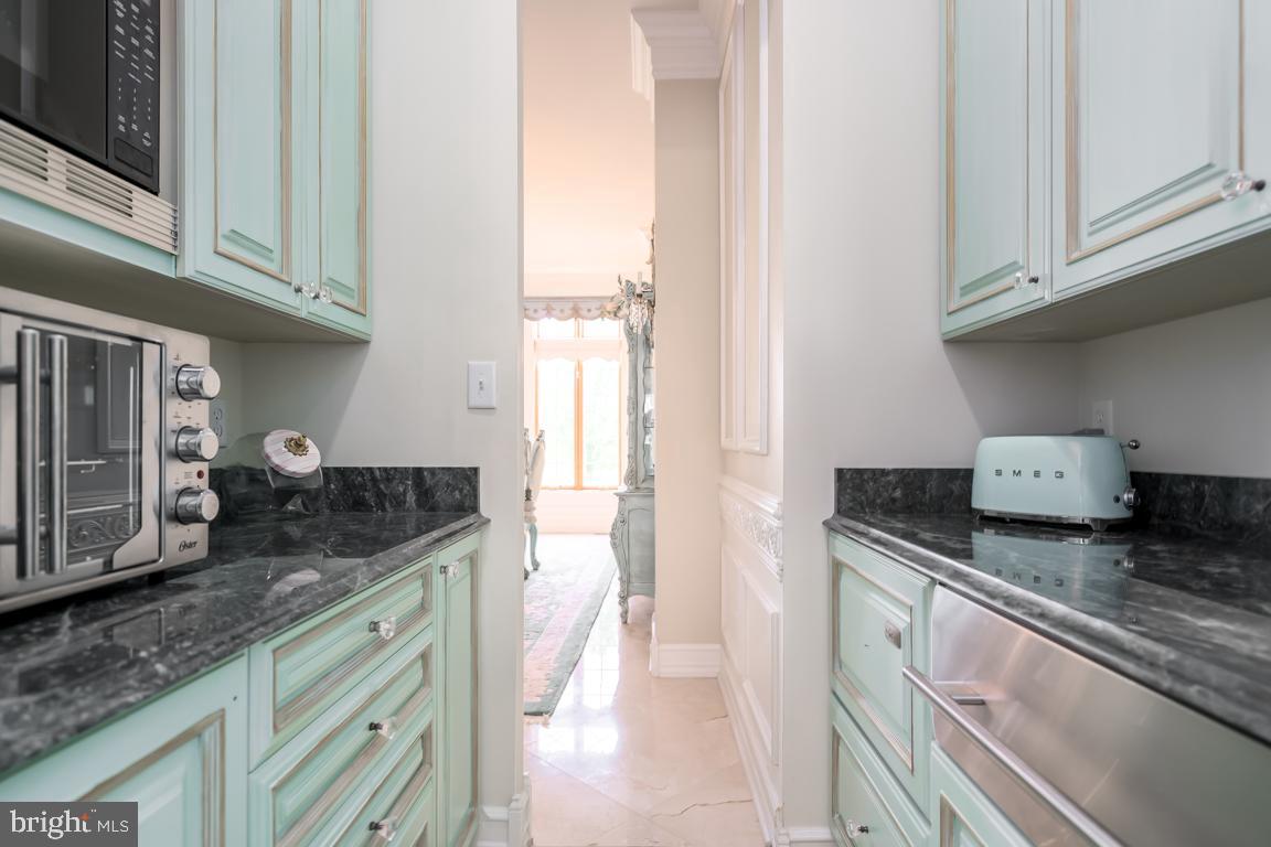 6779 Keller Lime Plant Road Frederick, MD 21703 - Photo 22 of 74 a kitchen with stainless steel appliances granite countertop a sink and cabinets