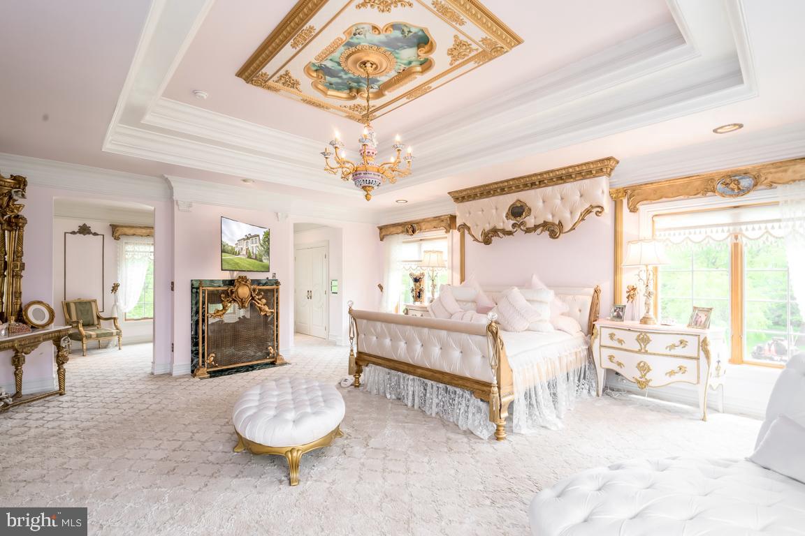 6779 Keller Lime Plant Road Frederick, MD 21703 - Photo 40 of 74 a living room with furniture and a chandelier