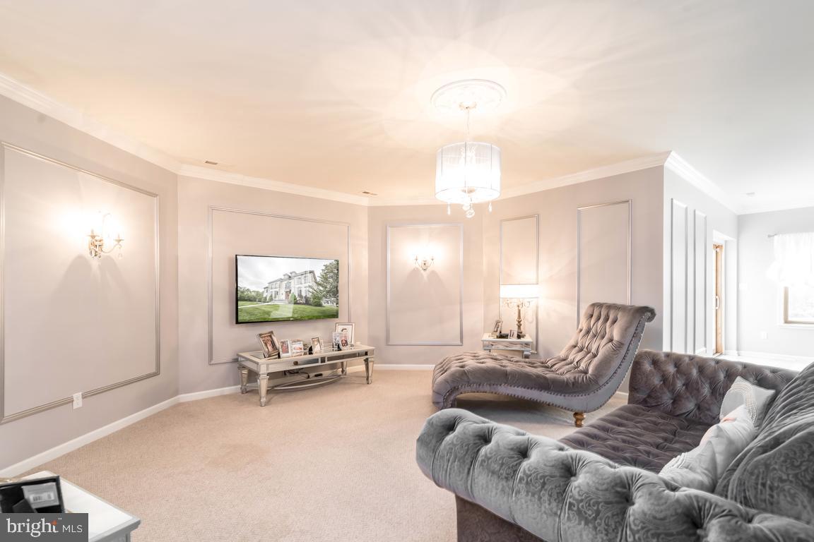 6779 Keller Lime Plant Road Frederick, MD 21703 - Photo 59 of 74 a living room with furniture and a flat screen tv