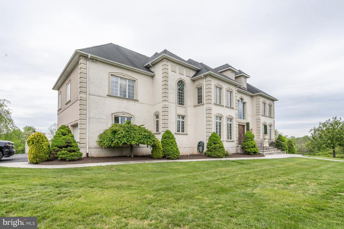 6779 Keller Lime Plant Road Frederick, MD 21703 - Photo 8 of 74 a front view of a house with a garden