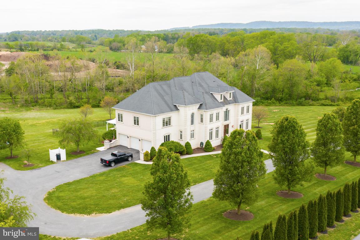 6779 Keller Lime Plant Road Frederick, MD 21703 - Photo 73 of 74 an aerial view of a house with pool and a yard