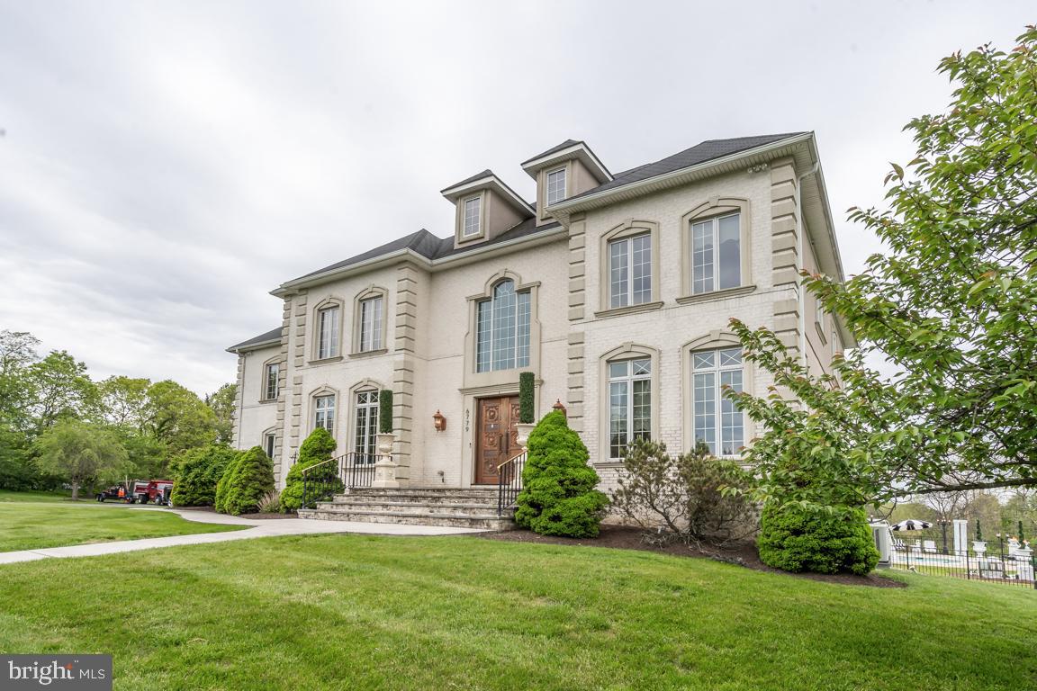 6779 Keller Lime Plant Road Frederick, MD 21703 - Photo 9 of 74 a front view of a house with a garden