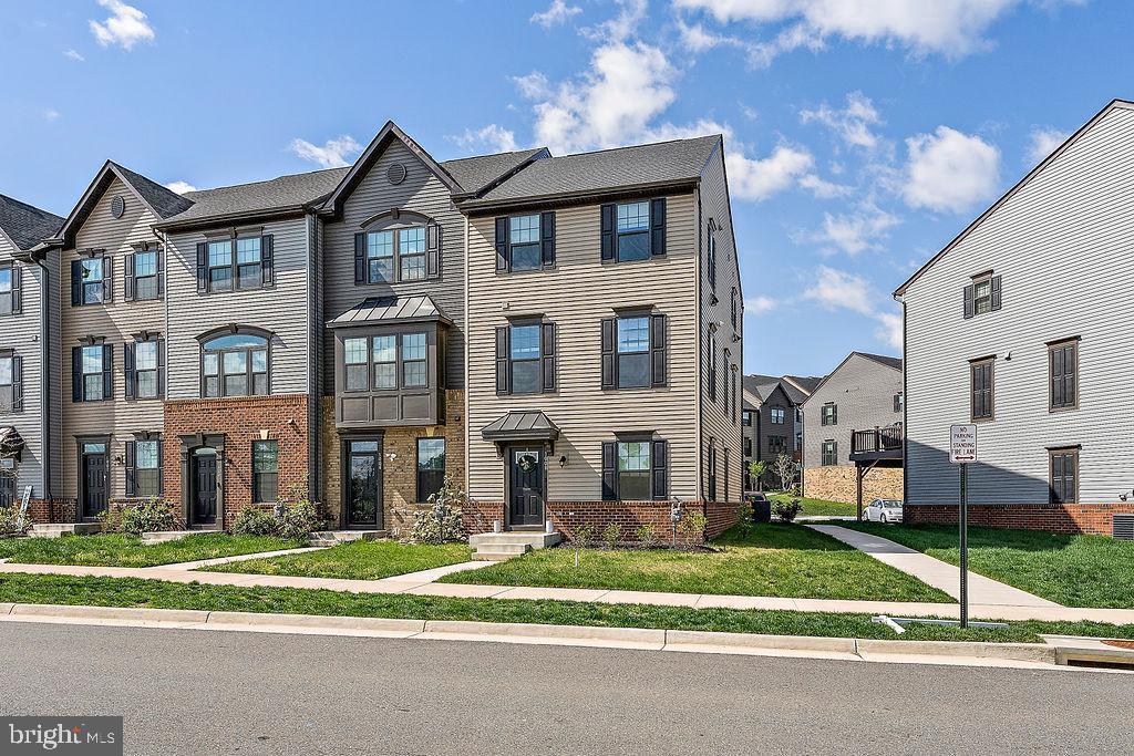 Modern townhome with inviting curb appeal.