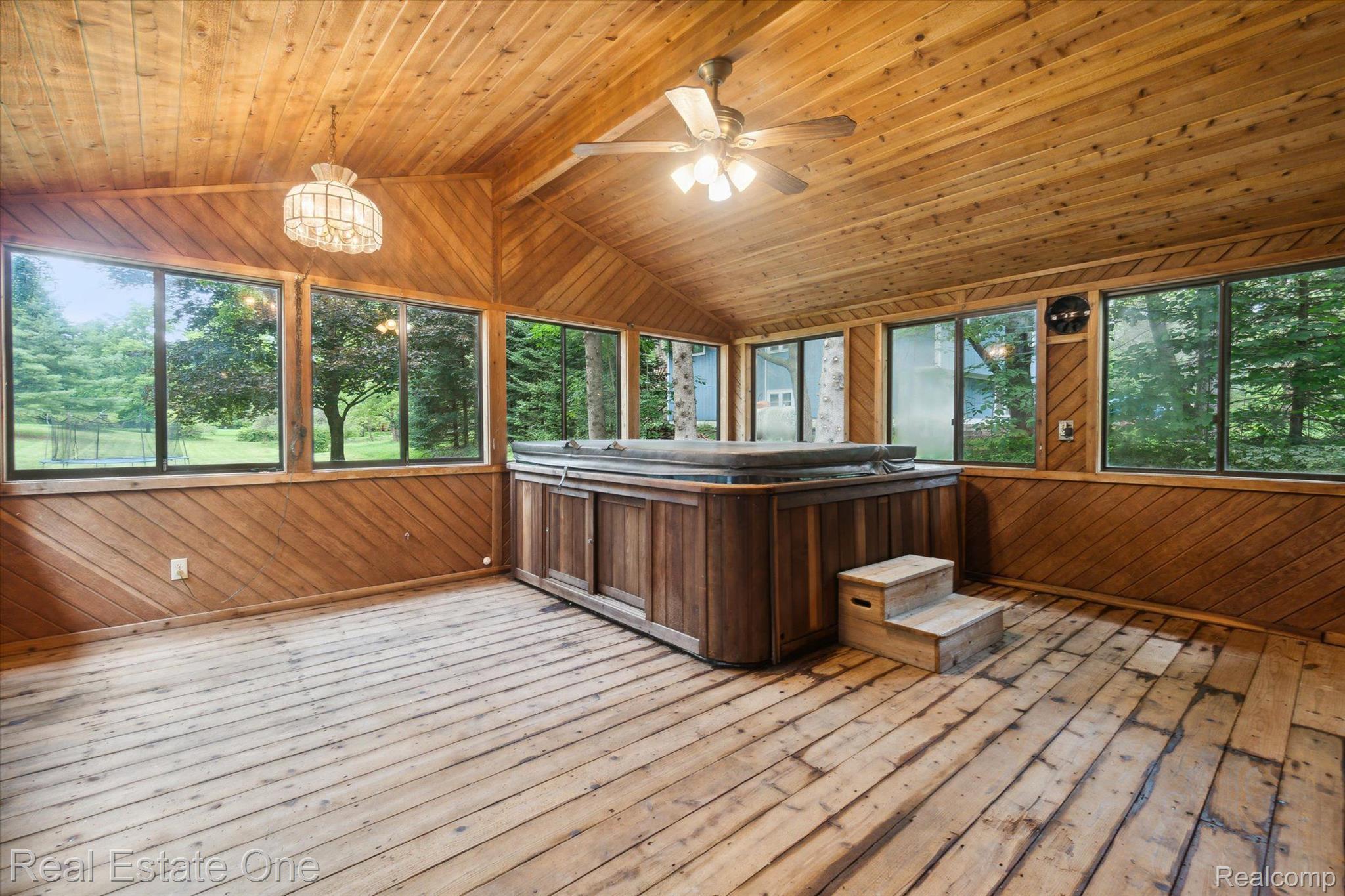 12160 Rattalee Lake Road Davisburg, MI 48350 - Photo 27 of 46 Cedar sauna room w/massive 8 person hot tub