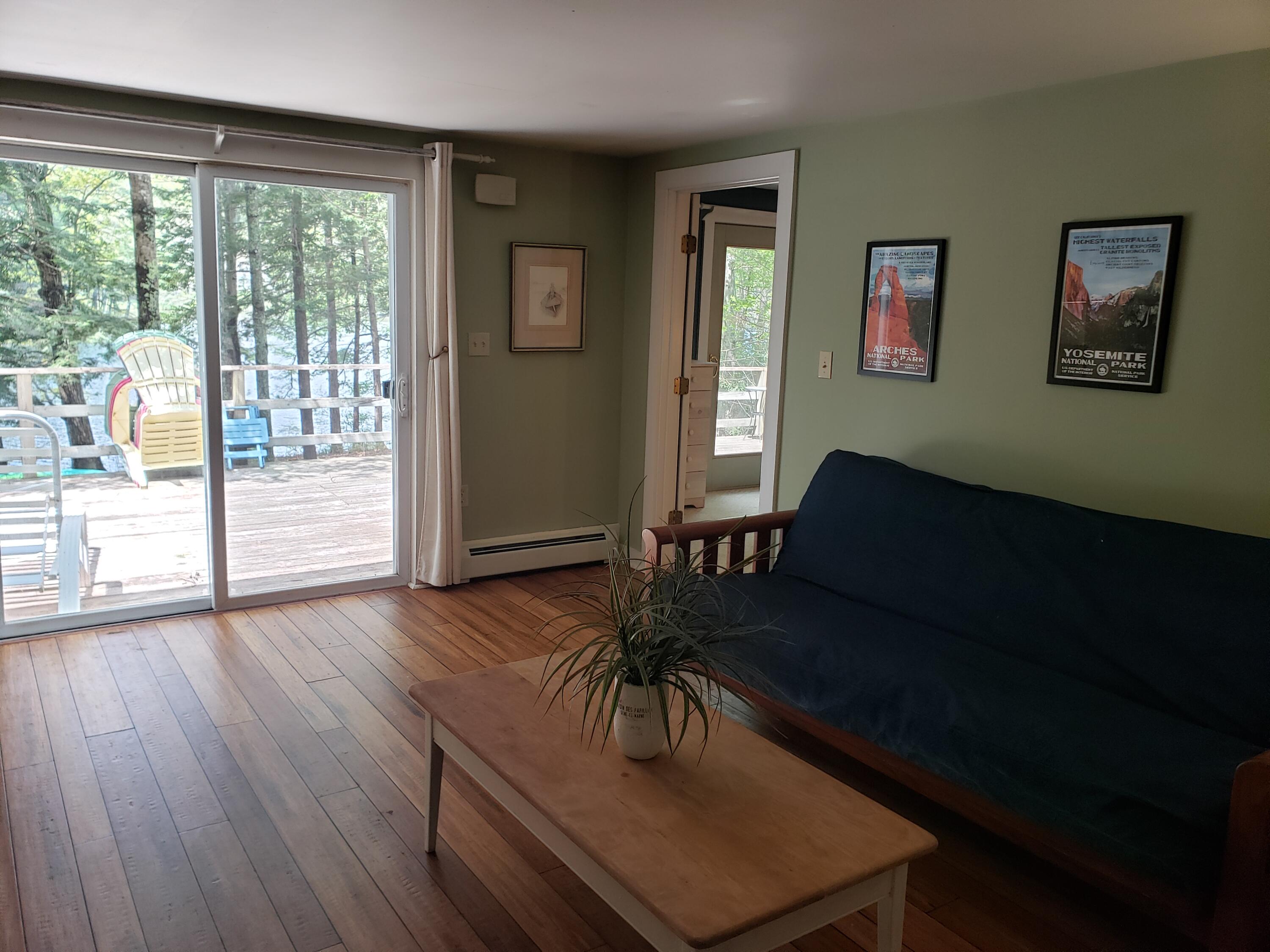 45 Riverside Drive Camden, ME 04843 - Photo 10 of 27 living room and sliding glass door
