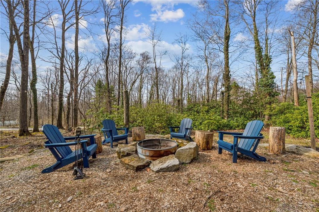 2095 Rocky Ridge Road Acme, PA 15610 - Photo 31 of 33 a view of a backyard with sitting area