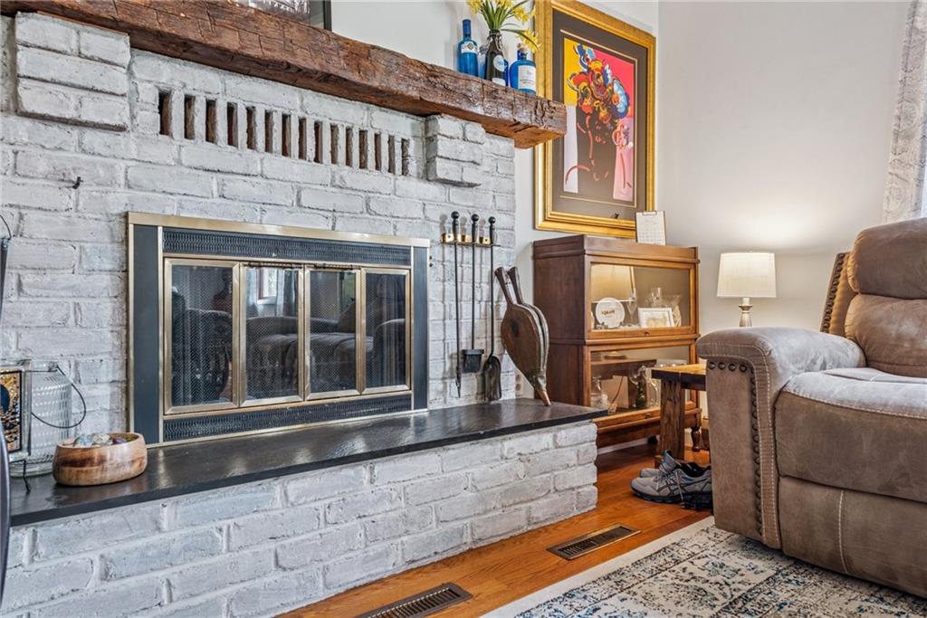 2095 Rocky Ridge Road Acme, PA 15610 - Photo 6 of 33 a living room with furniture and a fireplace