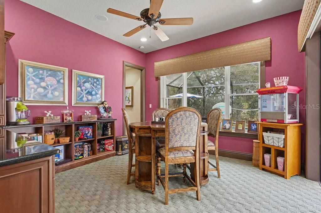 6662 Southwest 179th Ave Road Dunnellon, FL 34432 - Photo 28 of 51 a view of a dining room with furniture window and wooden floor