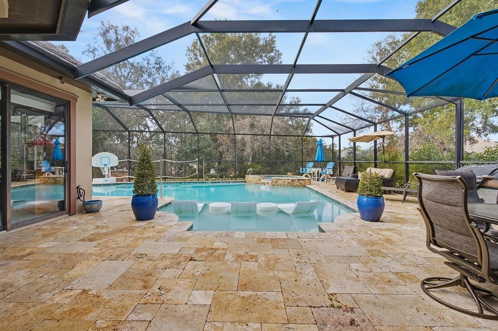 6662 Southwest 179th Ave Road Dunnellon, FL 34432 - Photo 36 of 51 a view of a swimming pool with a patio and a fountain