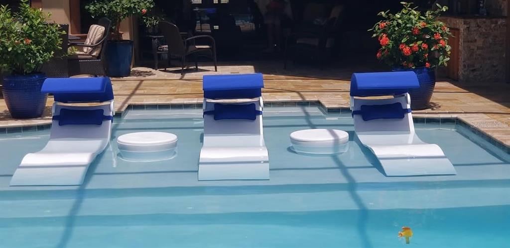 6662 Southwest 179th Ave Road Dunnellon, FL 34432 - Photo 39 of 51 a view of a patio with couches table and chairs and potted plants