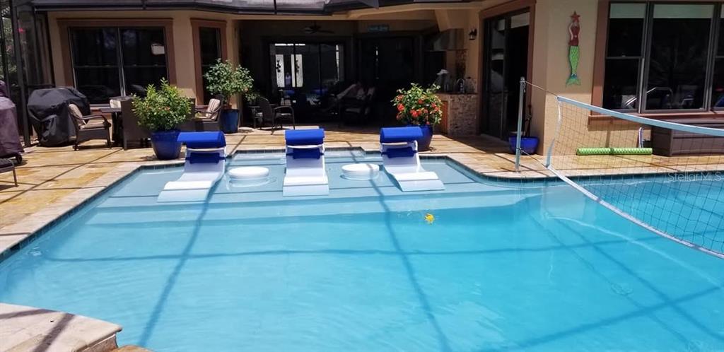6662 Southwest 179th Ave Road Dunnellon, FL 34432 - Photo 40 of 51 a view of a lobby with chair and tables