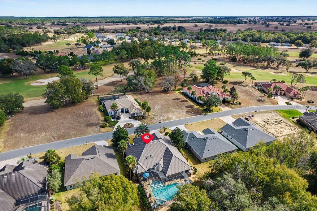 6662 Southwest 179th Ave Road Dunnellon, FL 34432 - Photo 44 of 51 an aerial view of residential houses with outdoor space and swimming pool