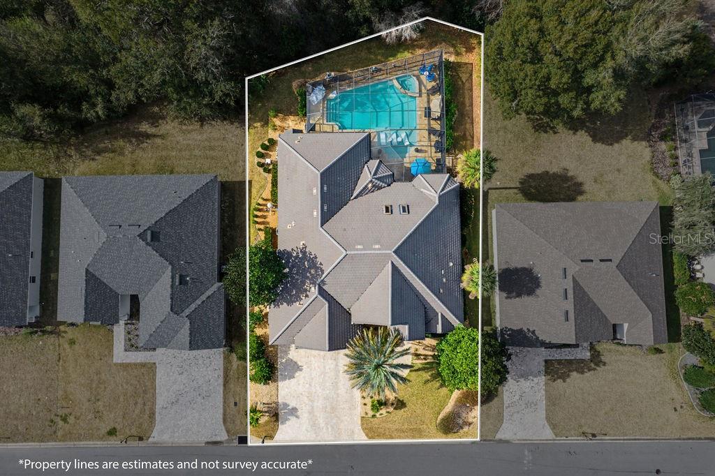 6662 Southwest 179th Ave Road Dunnellon, FL 34432 - Photo 50 of 51 an aerial view of a house with garden space and street view