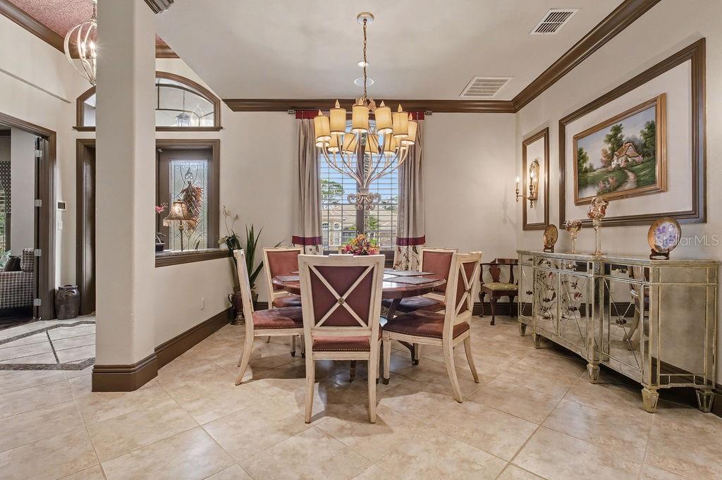 6662 Southwest 179th Ave Road Dunnellon, FL 34432 - Photo 5 of 51 a view of a dining room with furniture window and outside view