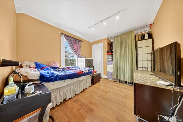 a bedroom with furniture and a bed