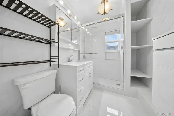 a bathroom with a toilet and a sink