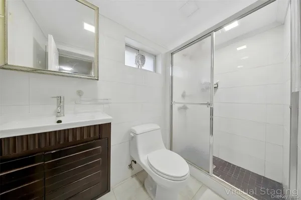a utility room with sink dryer and washer