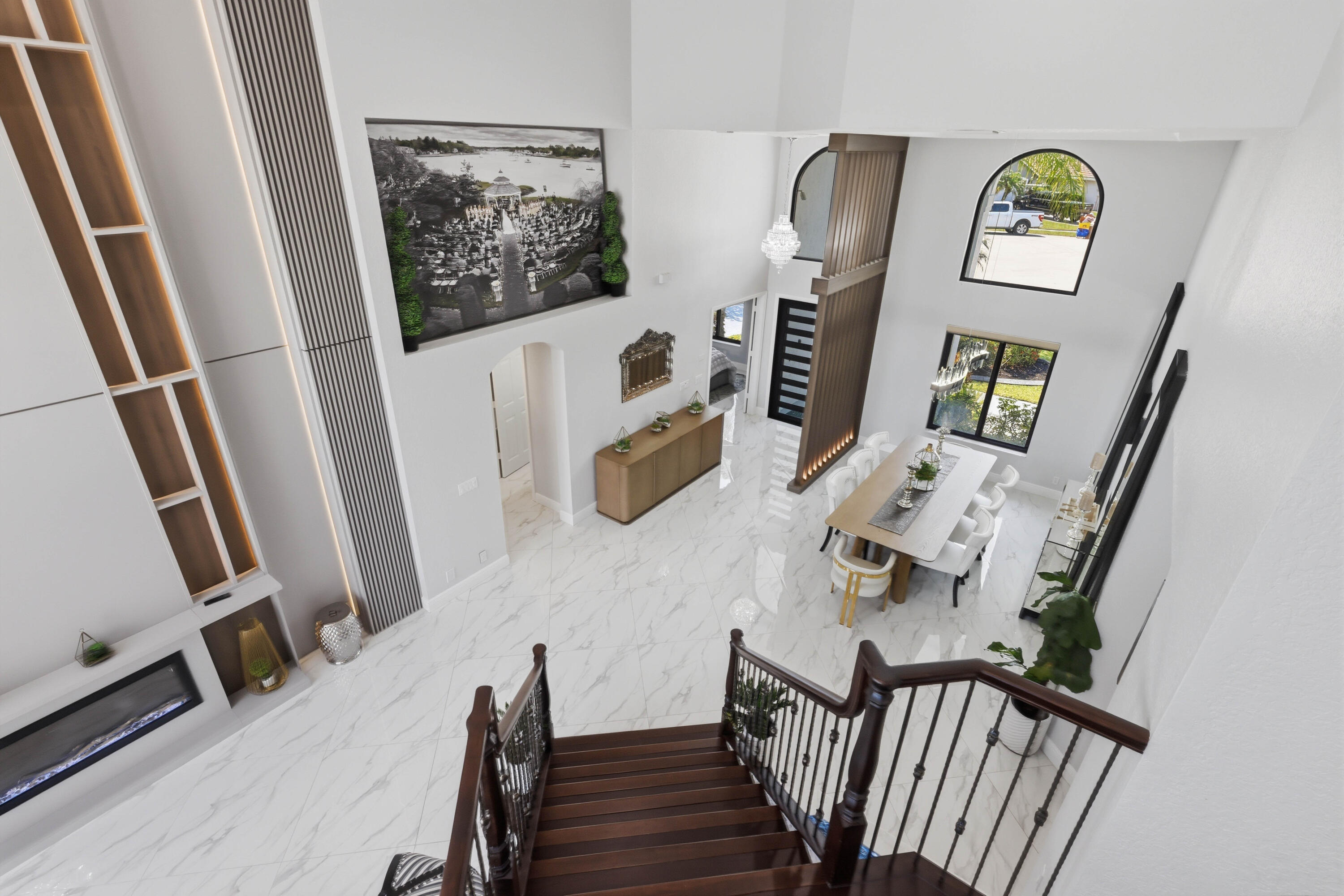 22257 Vista Lago Drive Boca Raton, FL 33428 - Photo 18 of 82 a view of a hallway with furniture and wooden floor