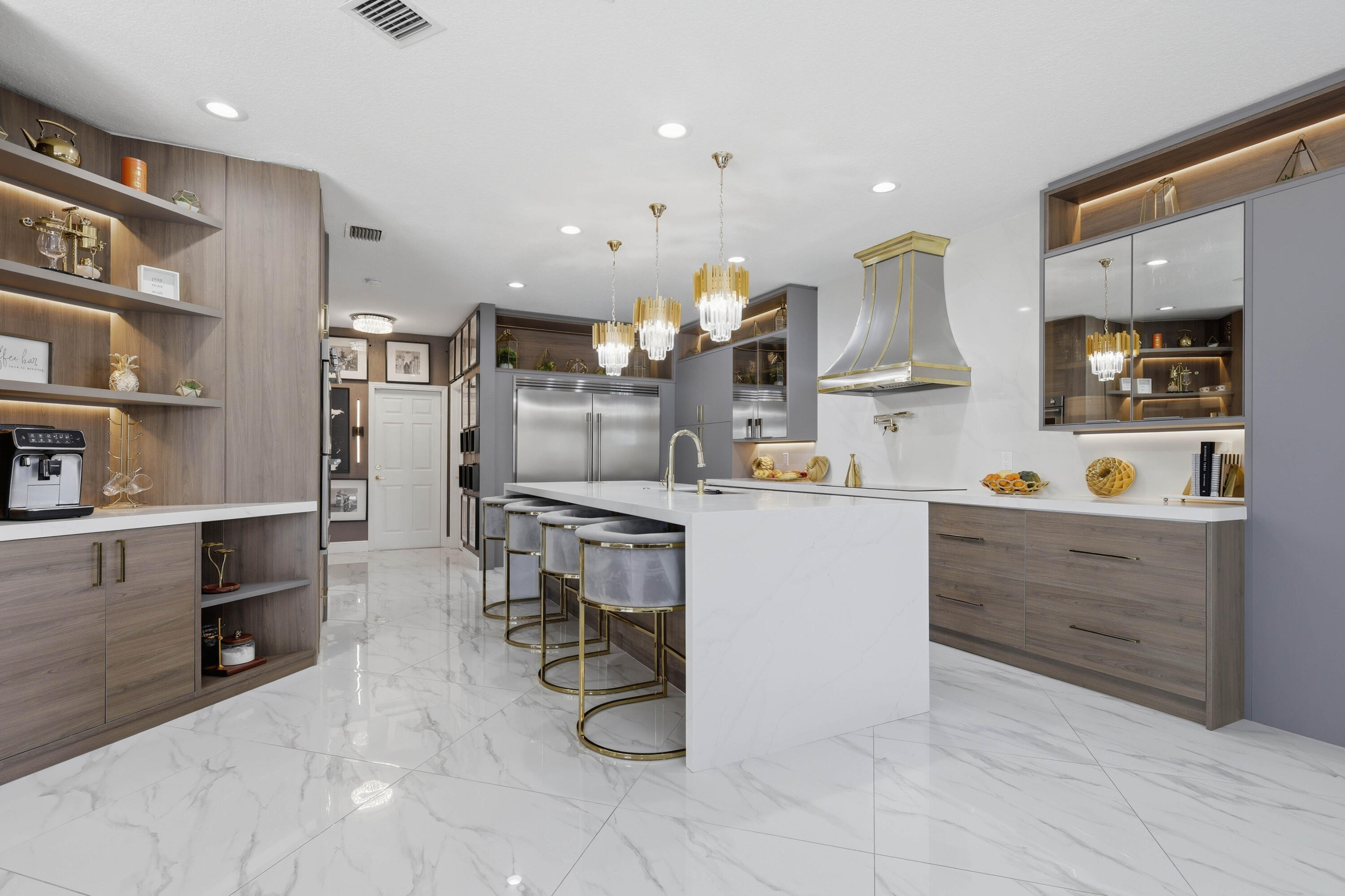 22257 Vista Lago Drive Boca Raton, FL 33428 - Photo 23 of 82 a kitchen with a sink appliances and cabinets