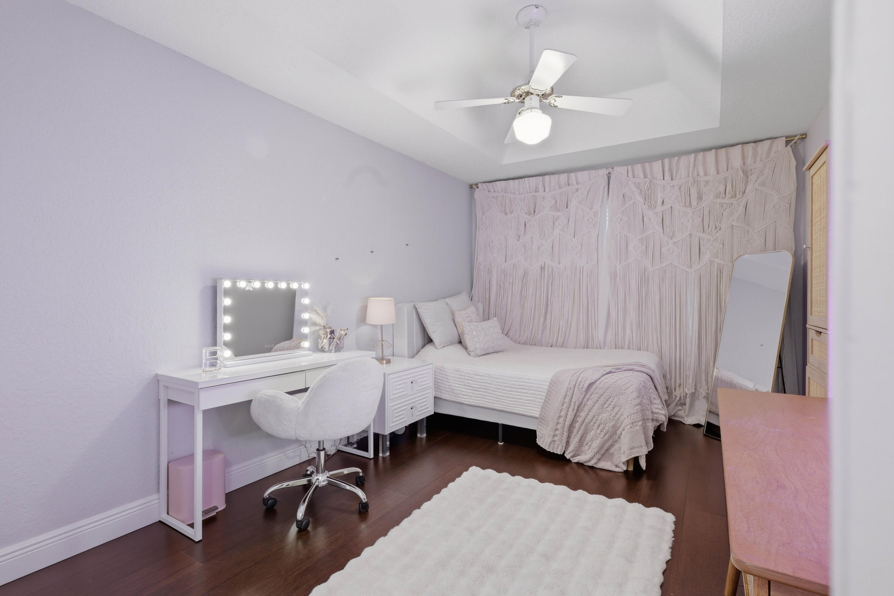 22257 Vista Lago Drive Boca Raton, FL 33428 - Photo 36 of 82 a bed room with a bed and a chandelier