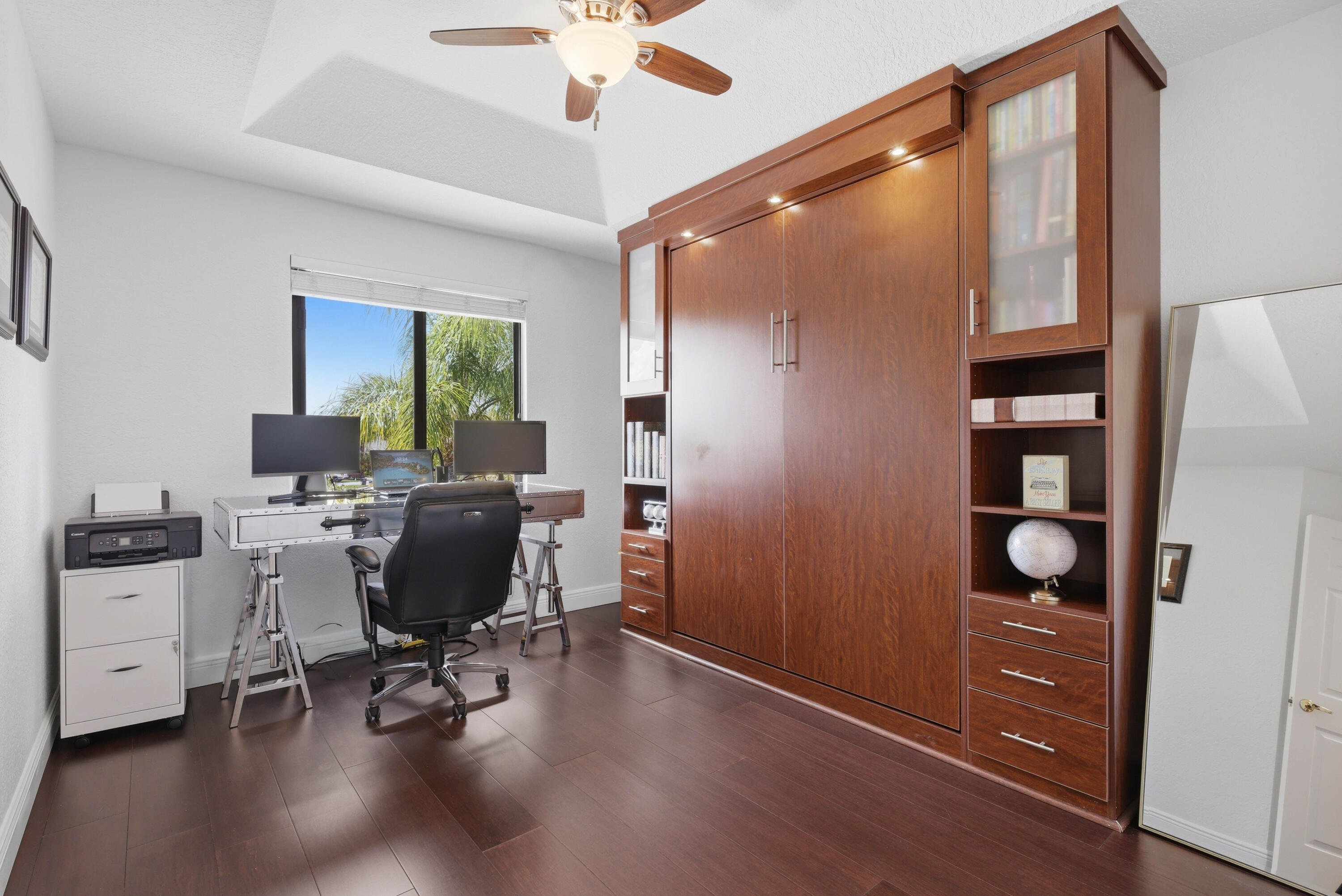 22257 Vista Lago Drive Boca Raton, FL 33428 - Photo 40 of 82 a view of a workspace with furniture and a window