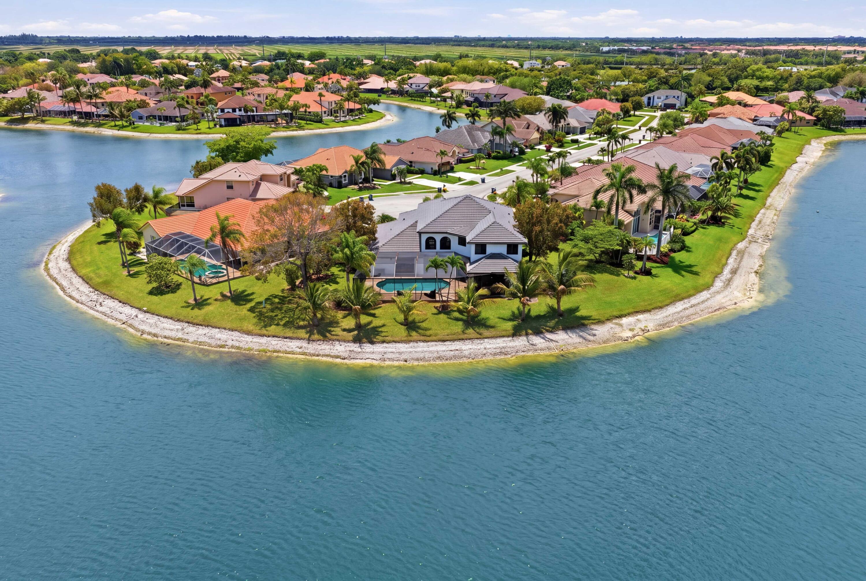 22257 Vista Lago Drive Boca Raton, FL 33428 - Photo 7 of 82 a view of a lake in middle of the house