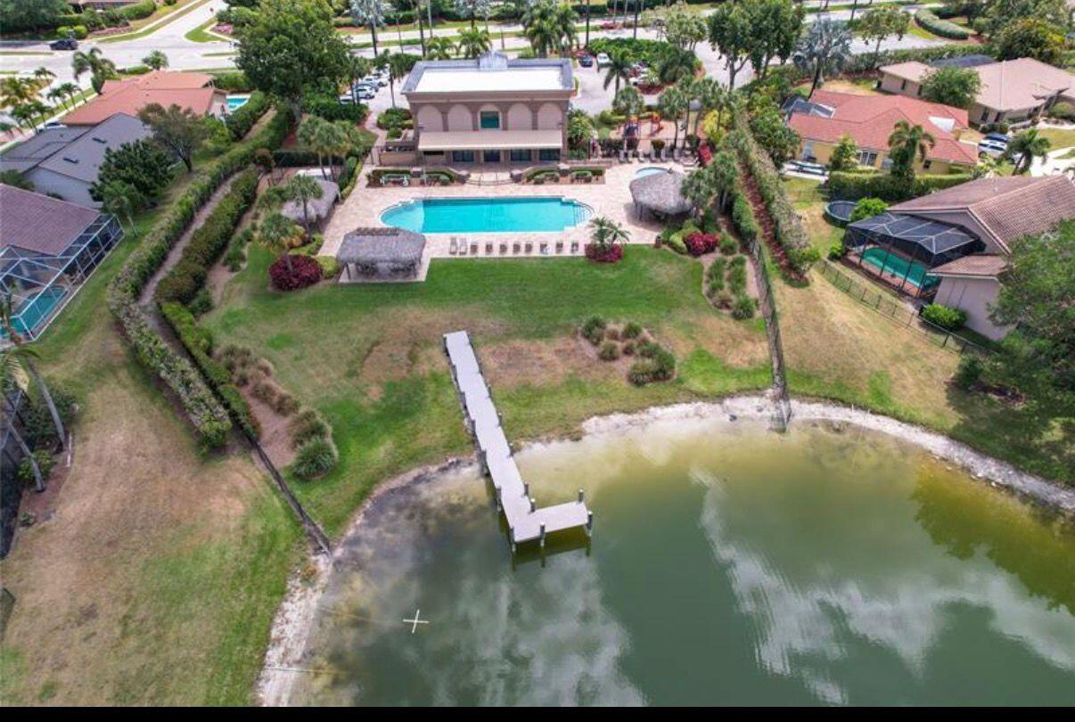 22257 Vista Lago Drive Boca Raton, FL 33428 - Photo 72 of 82 a view of a city with tall buildings