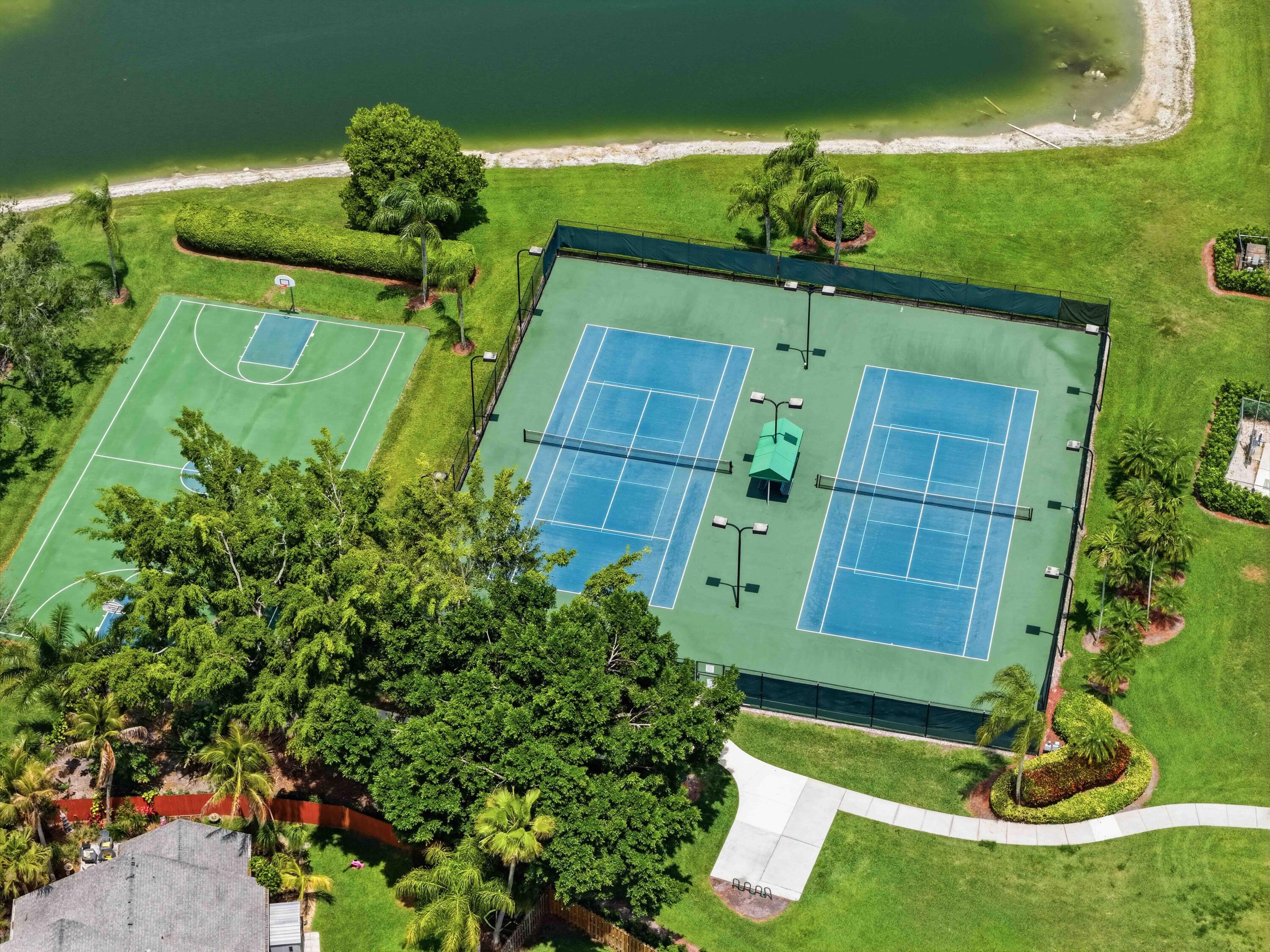 22257 Vista Lago Drive Boca Raton, FL 33428 - Photo 80 of 82 a backyard of a house