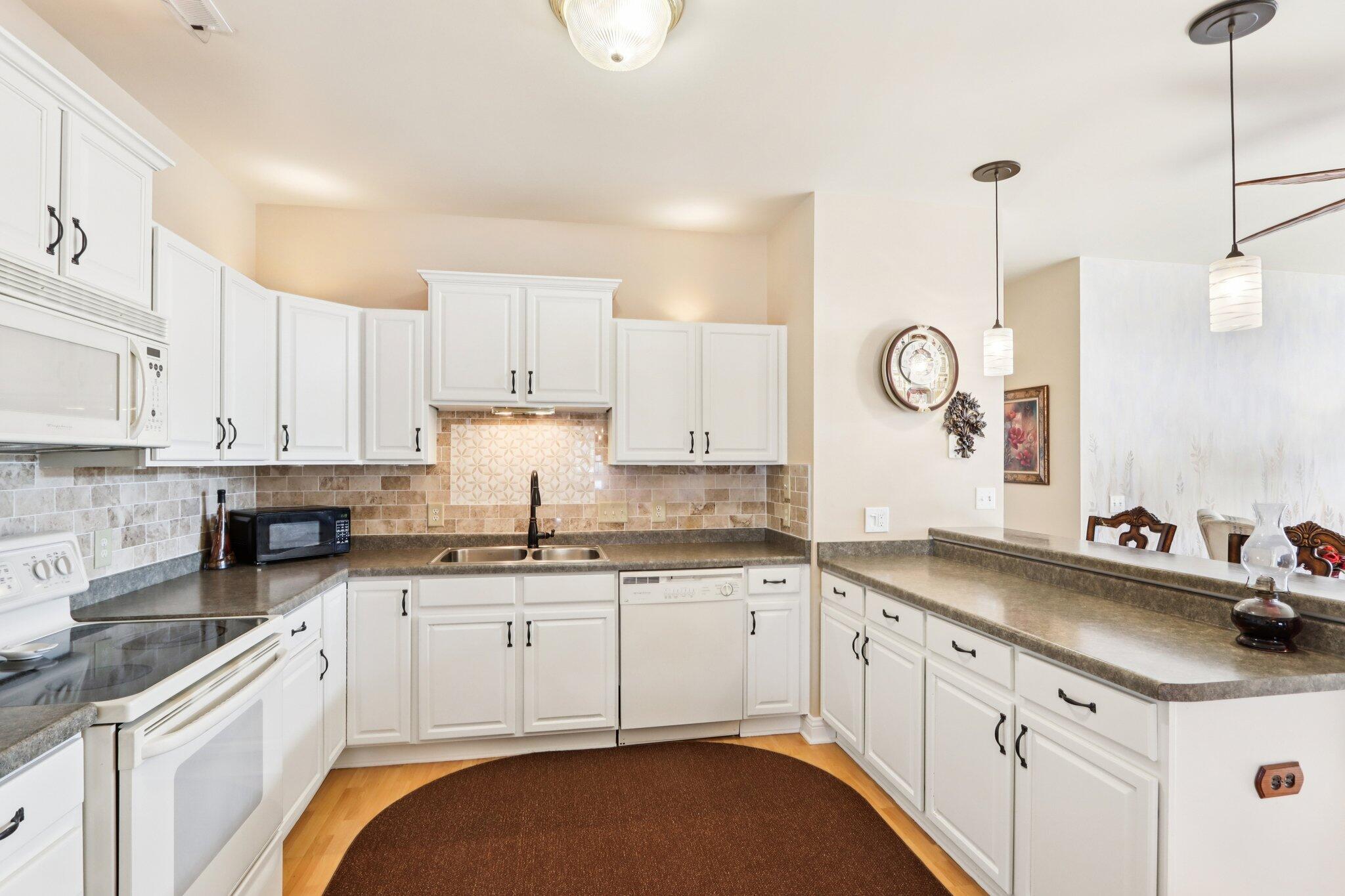 8648 Roxbury Way Oak Creek, WI 53154 - Photo 24 of 38 Cabinets Galore!