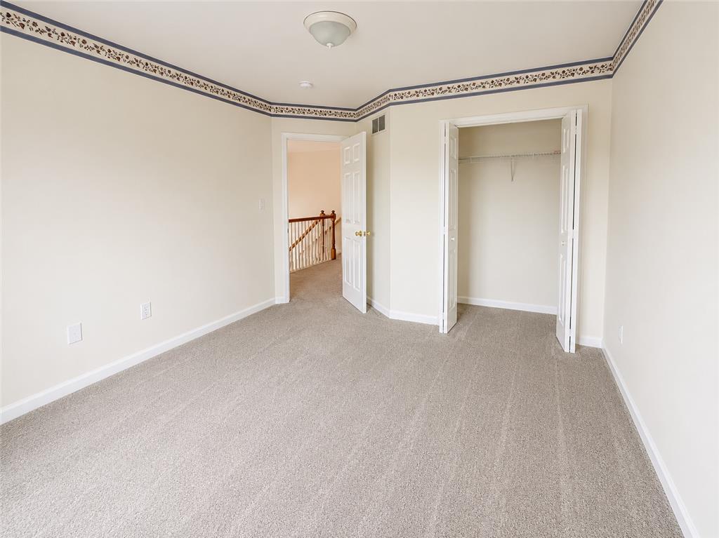 511 Howertown Road Northampton, PA 18067 - Photo 22 of 34 A well-lit room offers fresh carpet and ample closet space, ready for personalization.