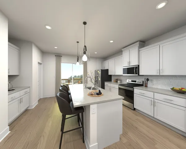 a kitchen with stainless steel appliances kitchen island granite countertop a stove a sink a refrigerator and white cabinets with wooden floor