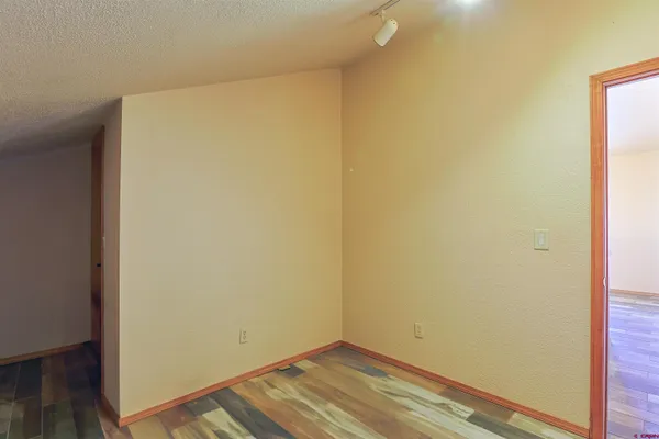 a view of small space with wooden floor