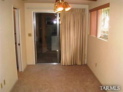 5 East Pastime Road Tucson, AZ 85705 - Photo 17 of 25 an empty room with windows and closet