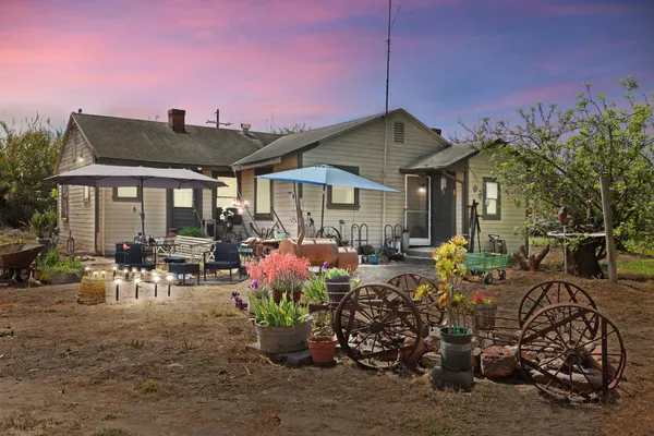 a front view of a house with patio